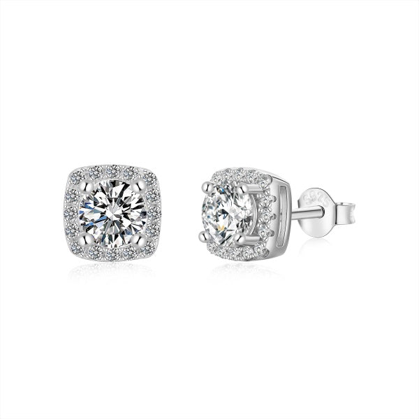 A pair of mini square studs with a round main stone in a silver setting.