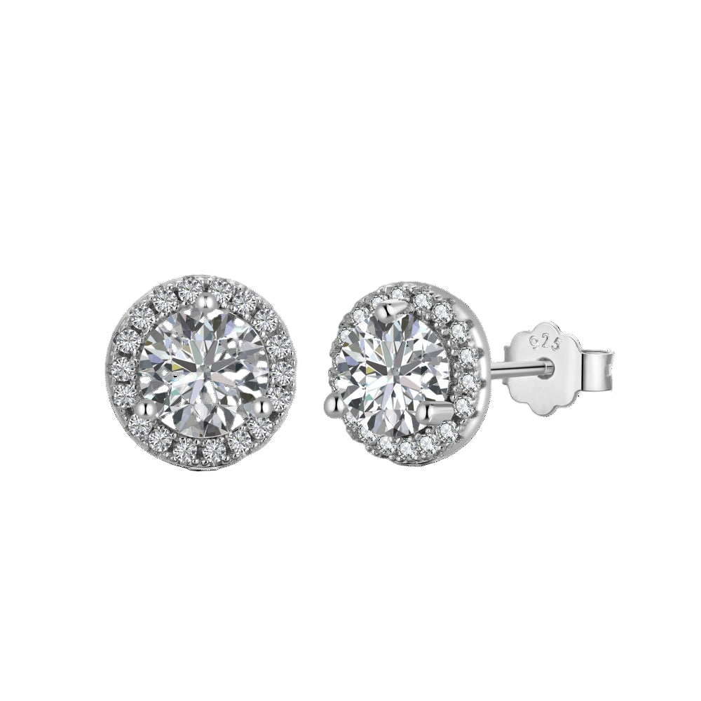 A pair of rhodium-plated stud earrings with a clear, zirconia main stone set in a small circle design.