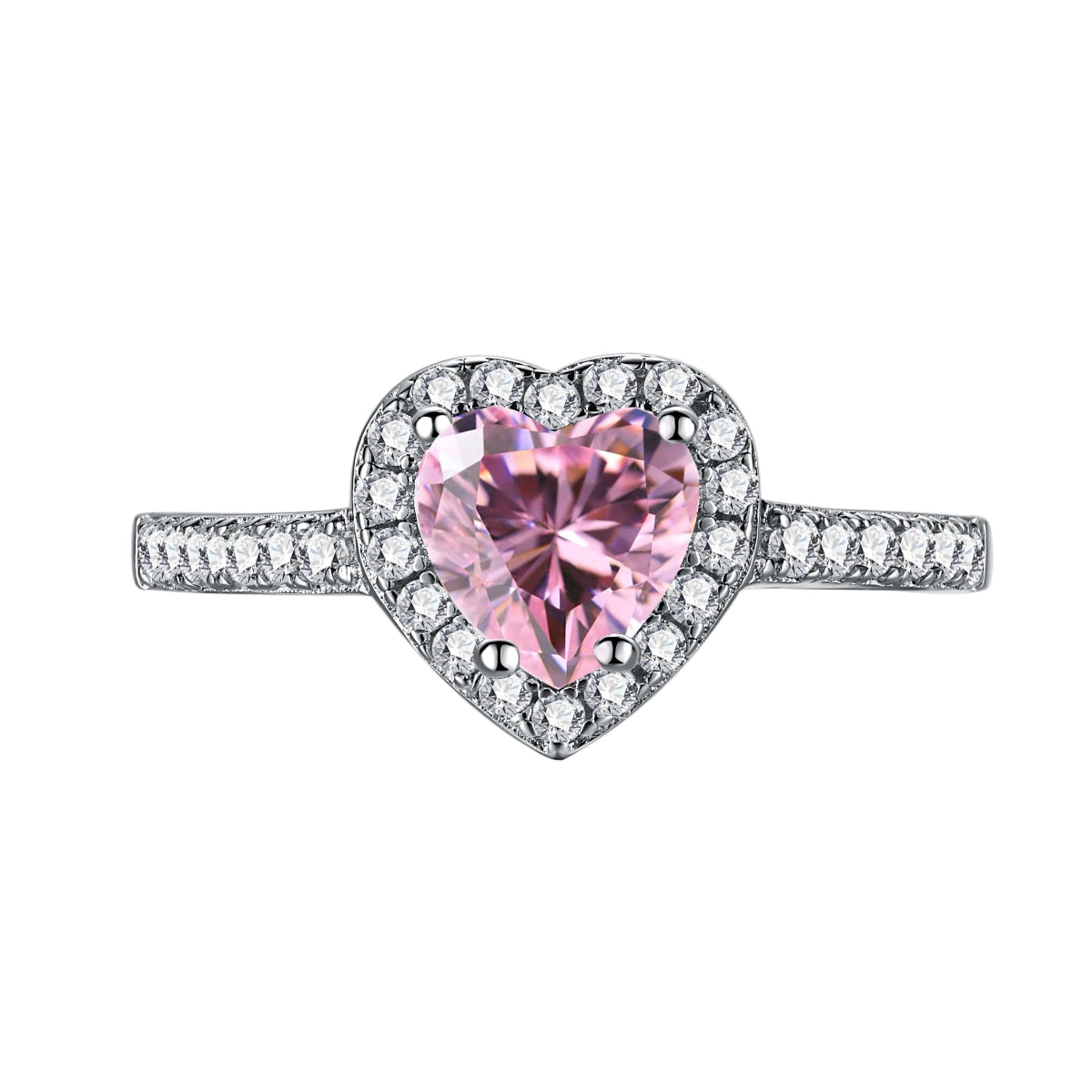 A heart-shaped pink cubic zirconia ring with a halo of smaller clear crystals on a silver band.