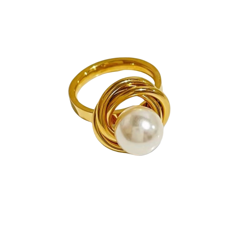 Gold ring with a pearl on a white background