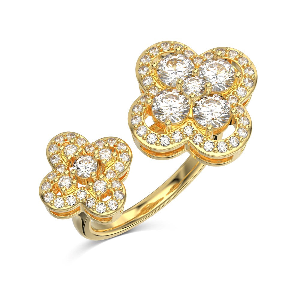 Gold ring with diamond-studded clover designs on a white background