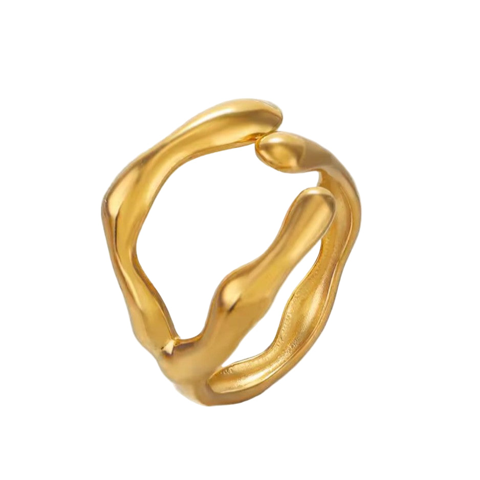 Gold ring with a wavy design on a white background