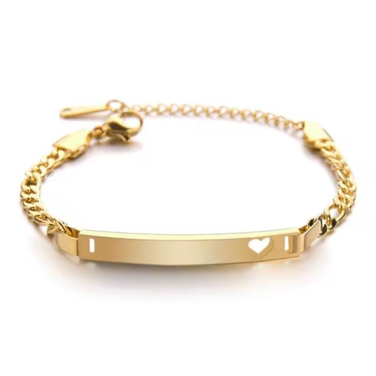 A Child’s Heart Engraved Bracelet in Gold Stainless Steel displayed on a white background.