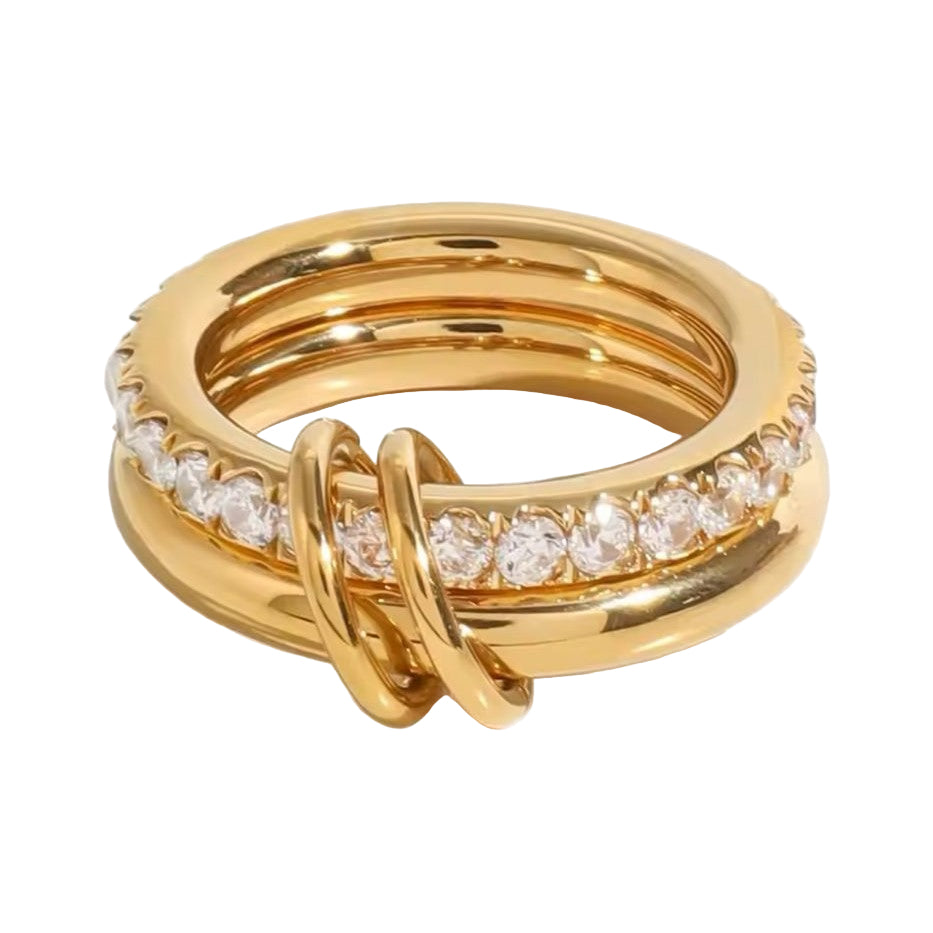 A gold-plated stainless steel double layered ring with the lower band embellished with crystals.