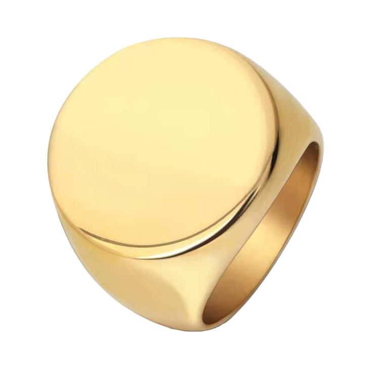 Men's gold engravable signet ring on a white background