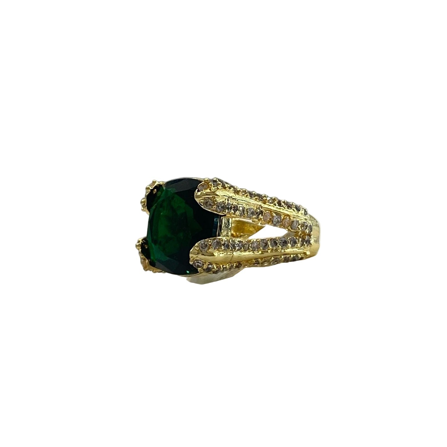 An elegant gold-colored adjustable gemstone ring with a prominent green centerpiece stone, displayed on a white box.