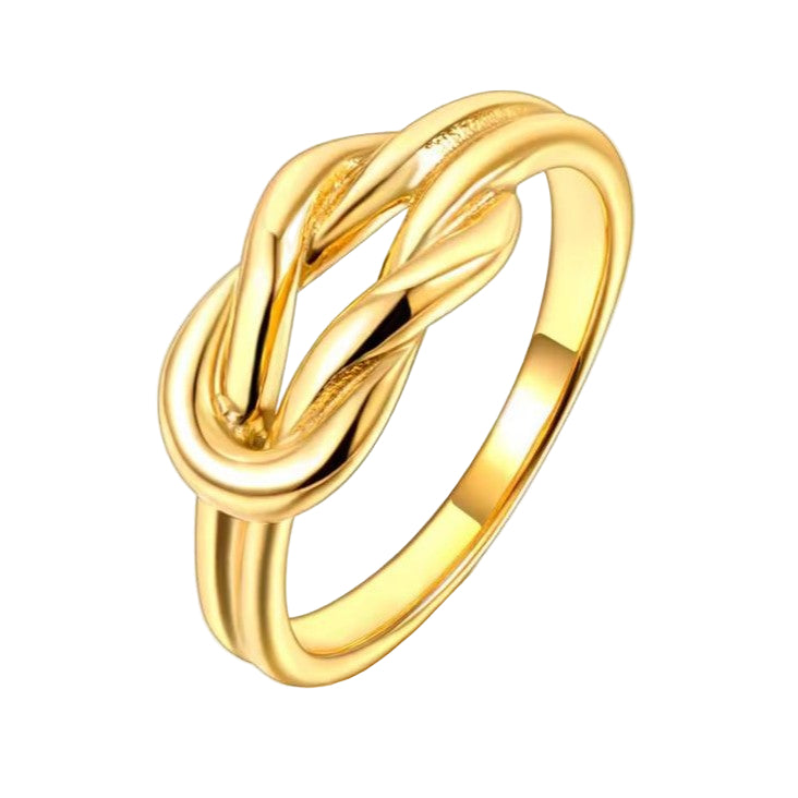 Gold ring with a knot design on a white background