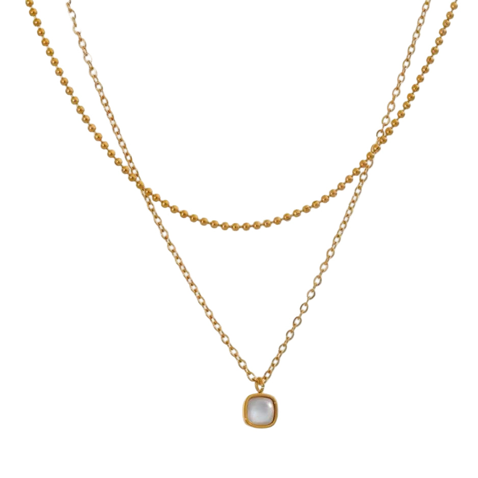 A gold-colored stainless steel necklace with a layered chain design and a square natural stone pendant.