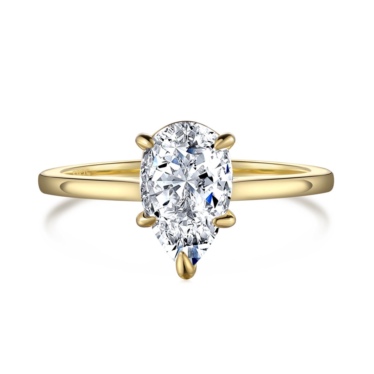 A gold-colored ring featuring a pear cut cubic zirconia set in a six-prong setting.