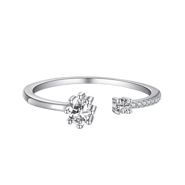 Adjustable silver ring with a clear, ornate design around the central stone.