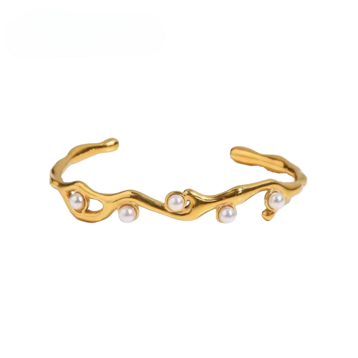 A gold-colored stainless steel bracelet with pearl adornments, displayed against a white background.
