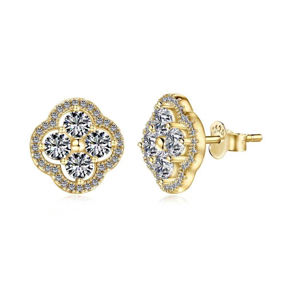 A pair of gold-plated sterling silver clover stud earrings with multiple cubic zirconia stones.