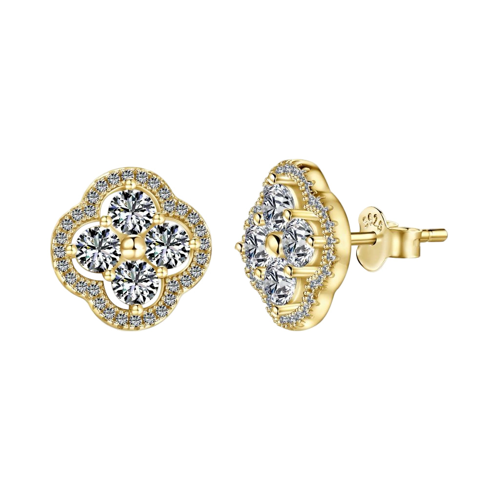 A pair of gold-plated sterling silver clover stud earrings with multiple cubic zirconia stones.