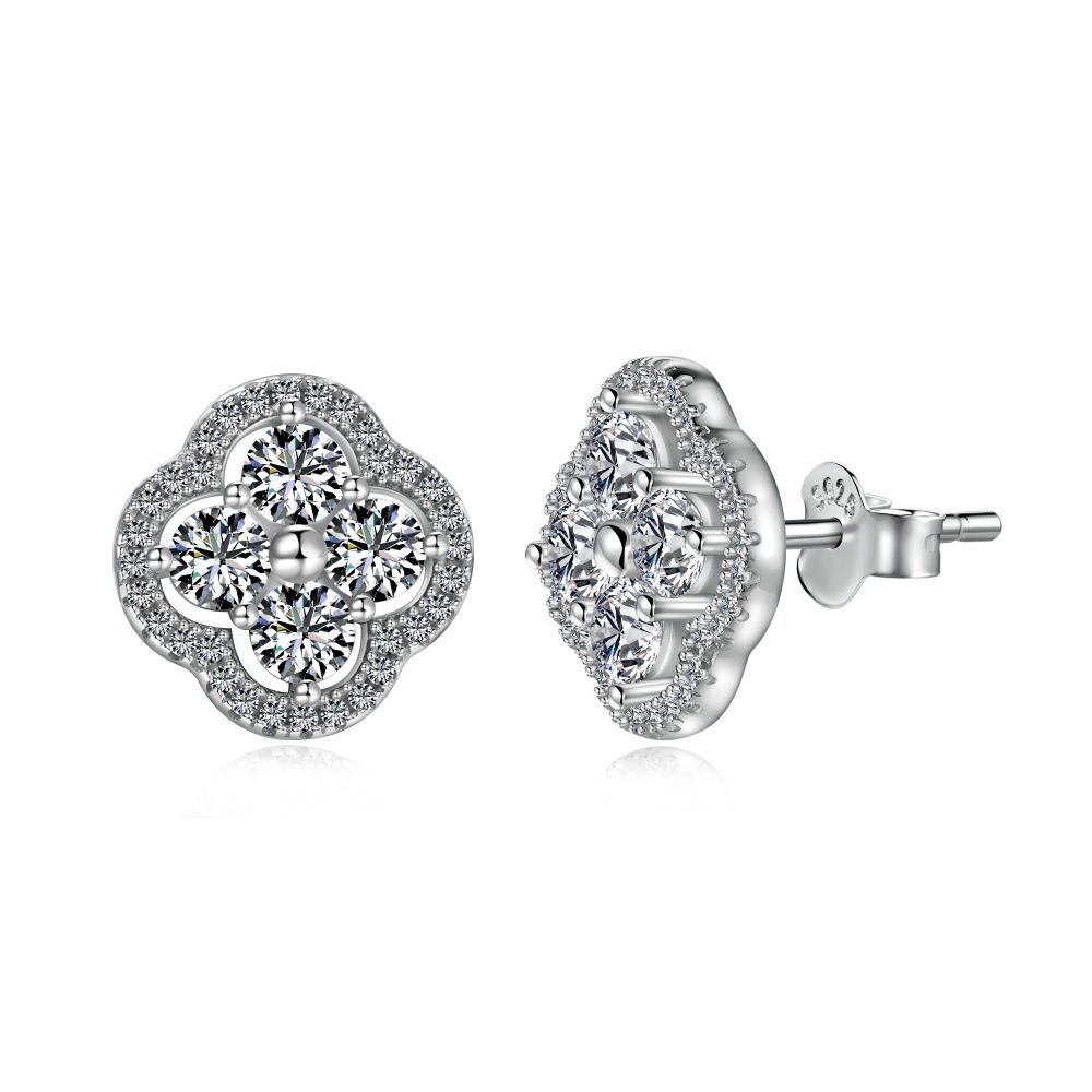 A pair of gold-plated sterling silver clover stud earrings with multiple cubic zirconia stones.