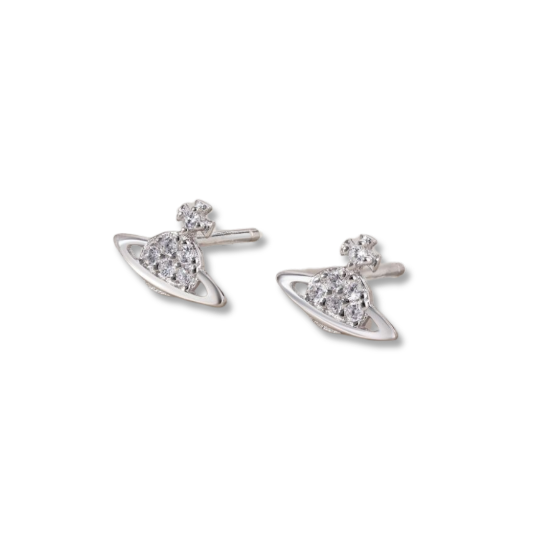 A pair of silver-colored stud earrings featuring a geometric pattern with a sparkling stone set in a graceful design.