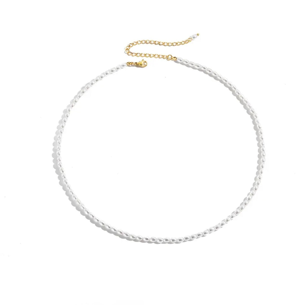 A pearl necklace with a gold-colored chain and multiple small white pearls chain.