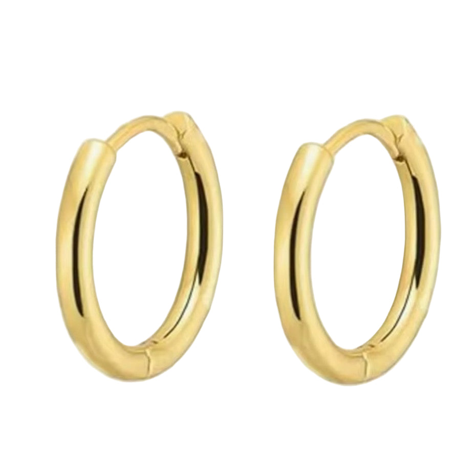 A pair of gold-colored huggie hoop earrings made of stainless steel.