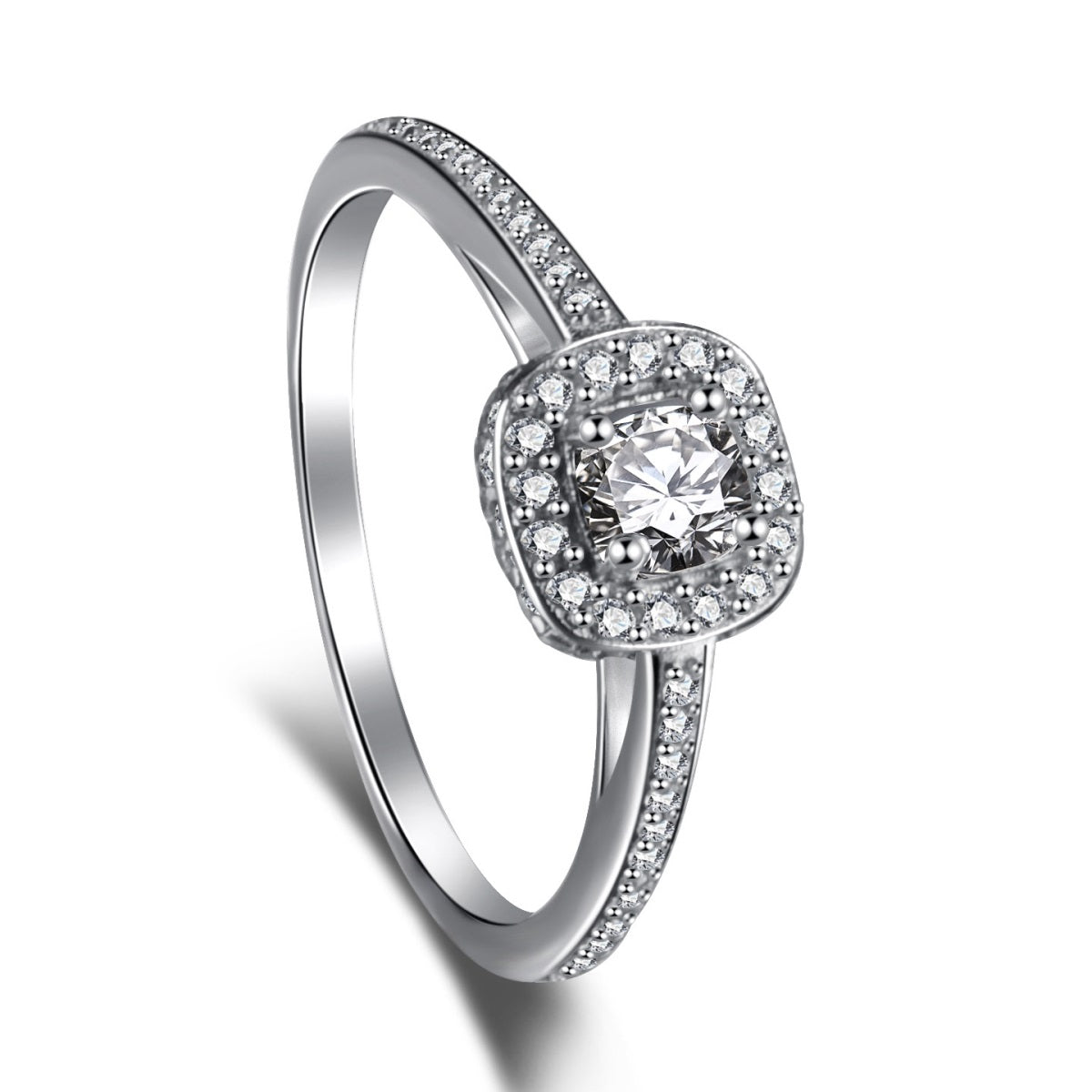 A silver square ring with a central cubic zirconia and surrounded by smaller clear stones on the band.