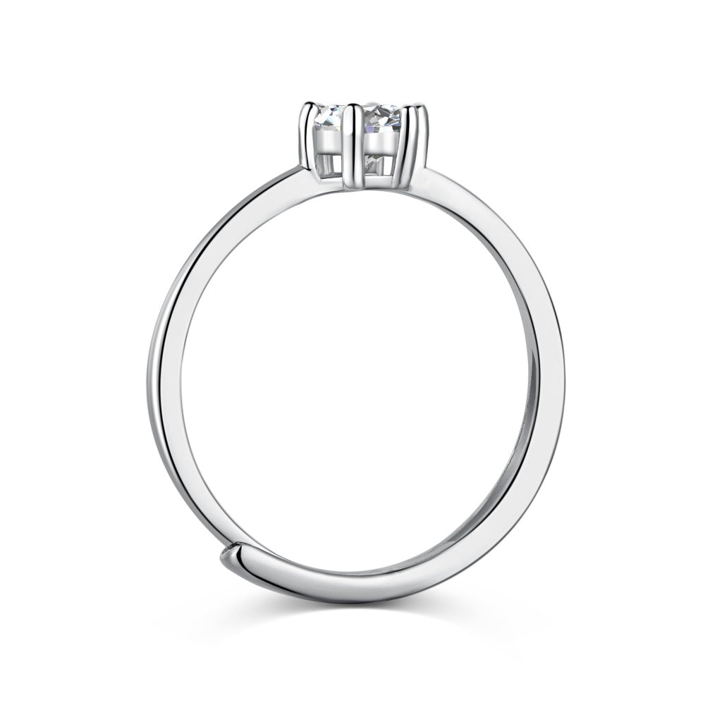 A silver-colored adjustable ring featuring a round 0.5 ct zirconia main stone set in a silver-colored band.