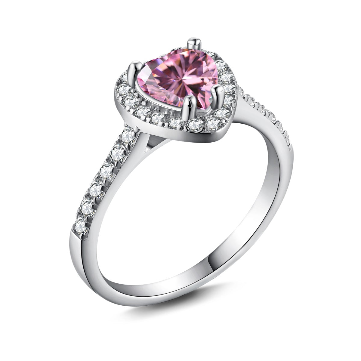 A heart-shaped pink cubic zirconia ring with a halo of smaller clear crystals on a silver band.