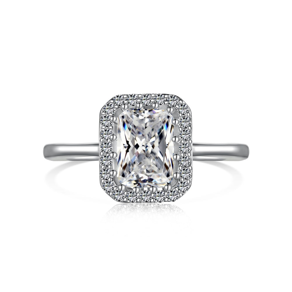 A radiant cut alia ring with a main stone size of 5mm*7mm, set in a white gold band.