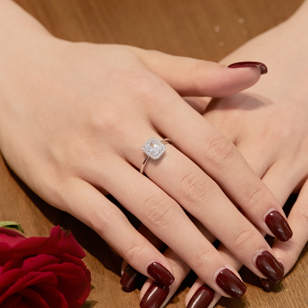 A radiant cut alia ring with a main stone size of 5mm*7mm, set in a white gold band.