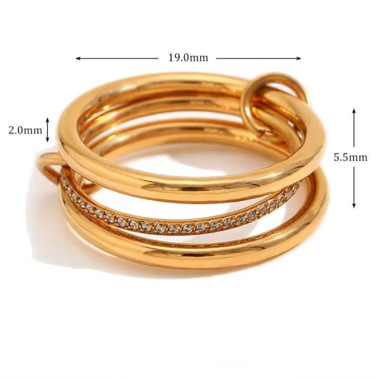 A ring with set of three interlocking rings with gold colors, crafted from 18K gold plated stainless steel.