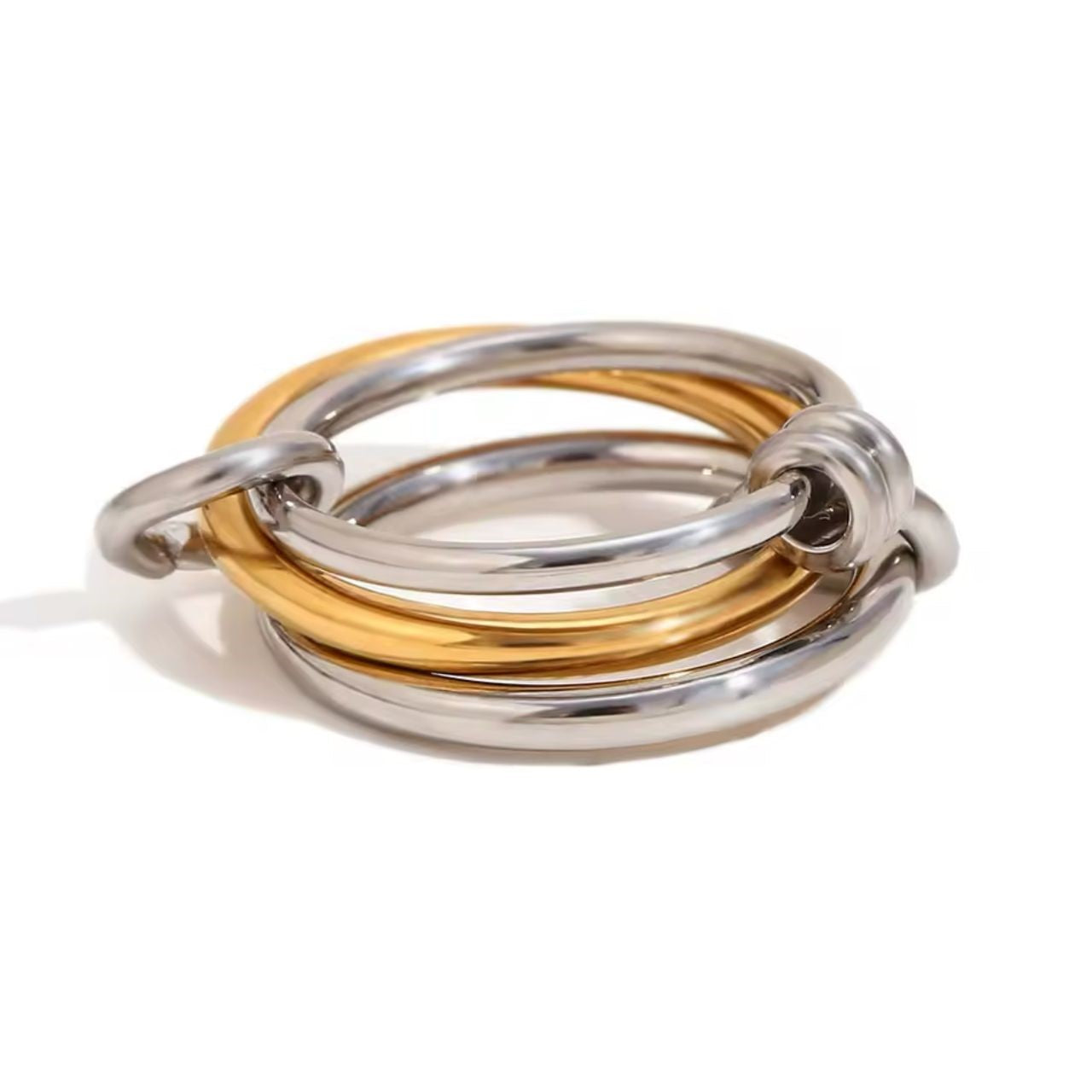 A ring with set of three interlocking rings with gold and silver colors, crafted from 18K gold plated stainless steel.