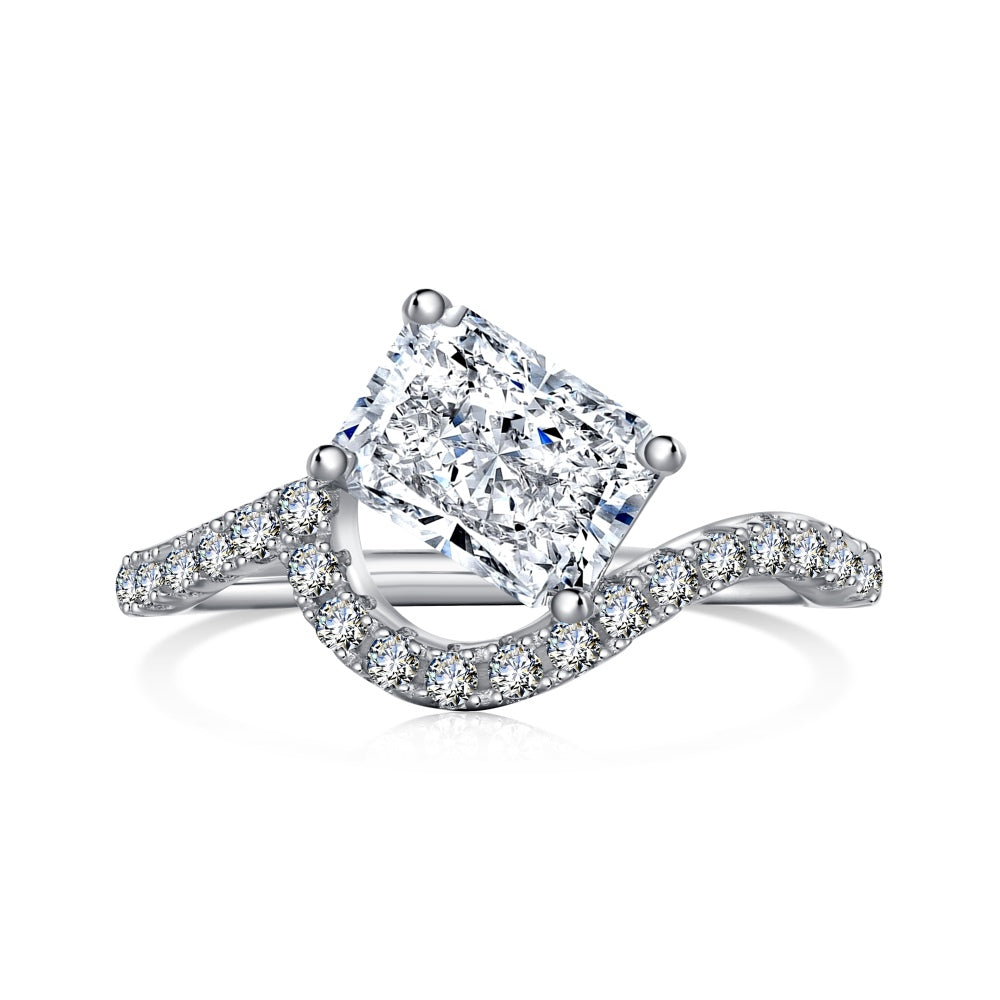 A sterling silver ring featuring a main stone of 6mm*8mm size, shaped as a rectangle and set with smaller round diamonds.