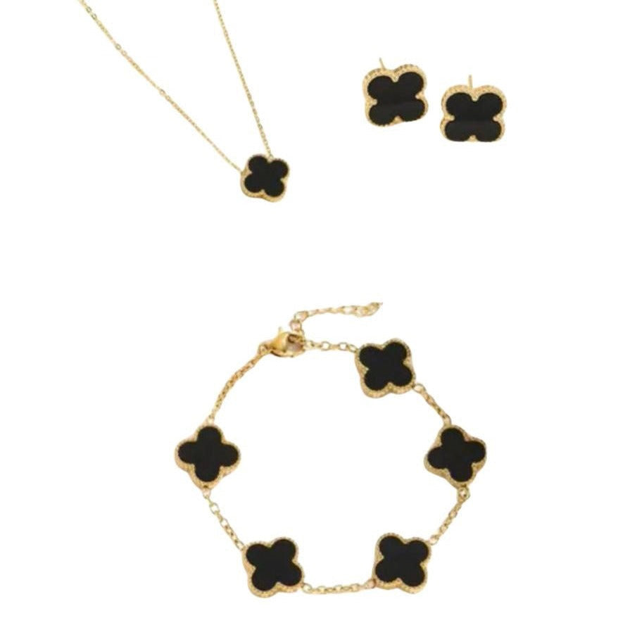 A set of 4 Leaf Clover jewellery including a necklace, bracelet, and earrings, with gold-plated clovers on a stainless steel chain.