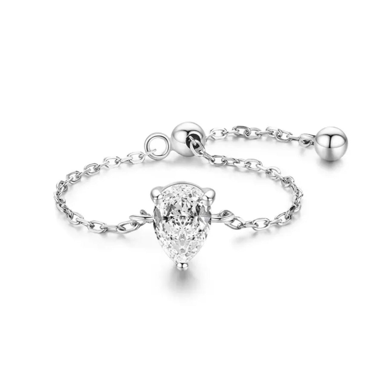 A silver chain ring with gemstone design on a white background