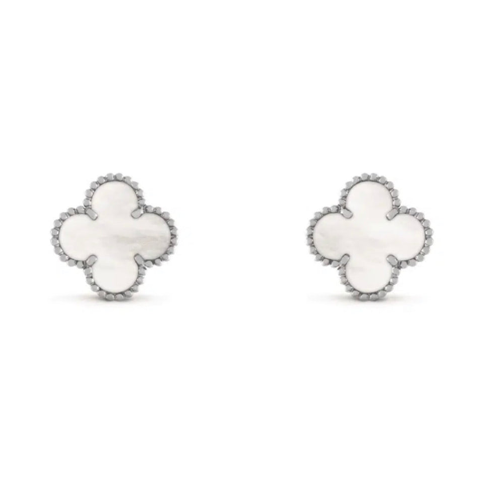 Pair of white clover-shaped earrings on a white background