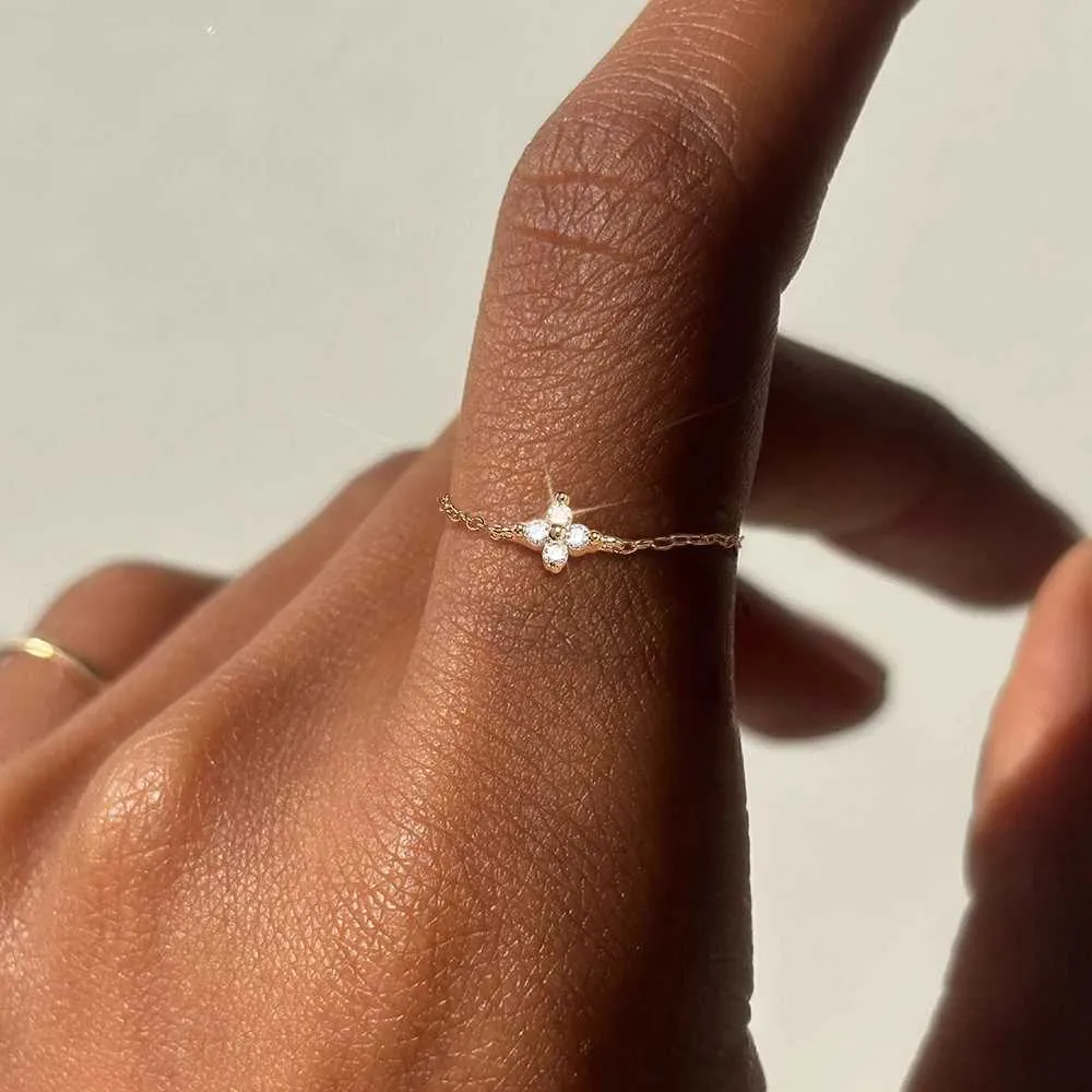 Adjustable Flower Chain Ring – 925 Sterling Silver Zirconia displayed on a females hand