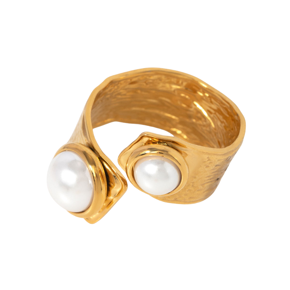 Gold ring with two pearls on a white background