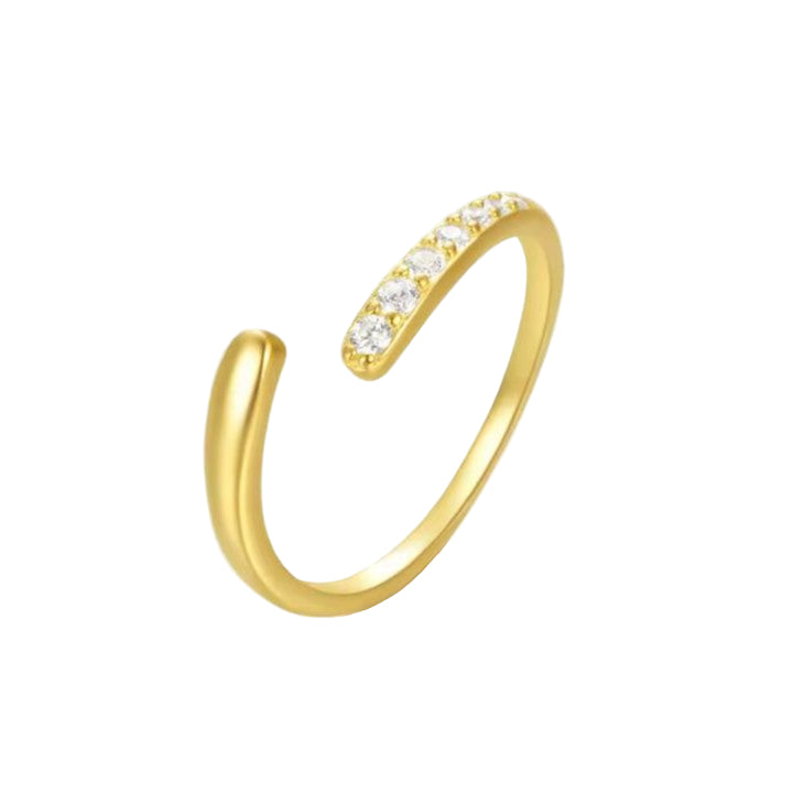 Gold open ring with small diamonds on a white background