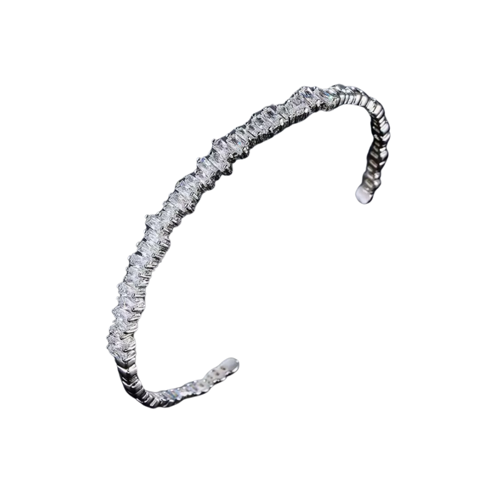 Adjustable Alexandra Bangle in silver displayed on a white background.