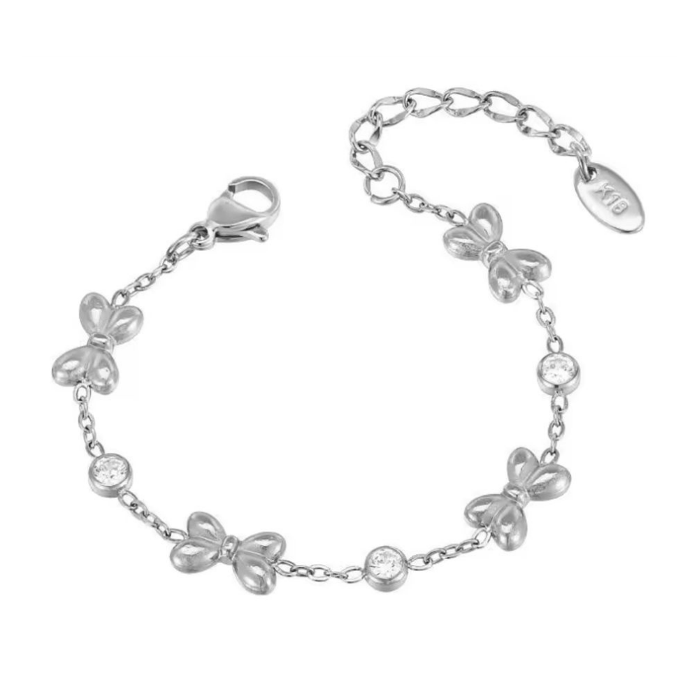 Silver bracelet with butterfly designs and clear stones on a white background