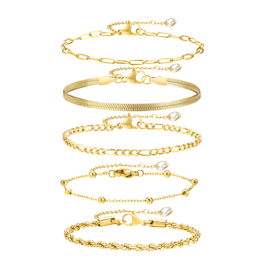 Set of five stainless steel gold colored bracelets on a white background