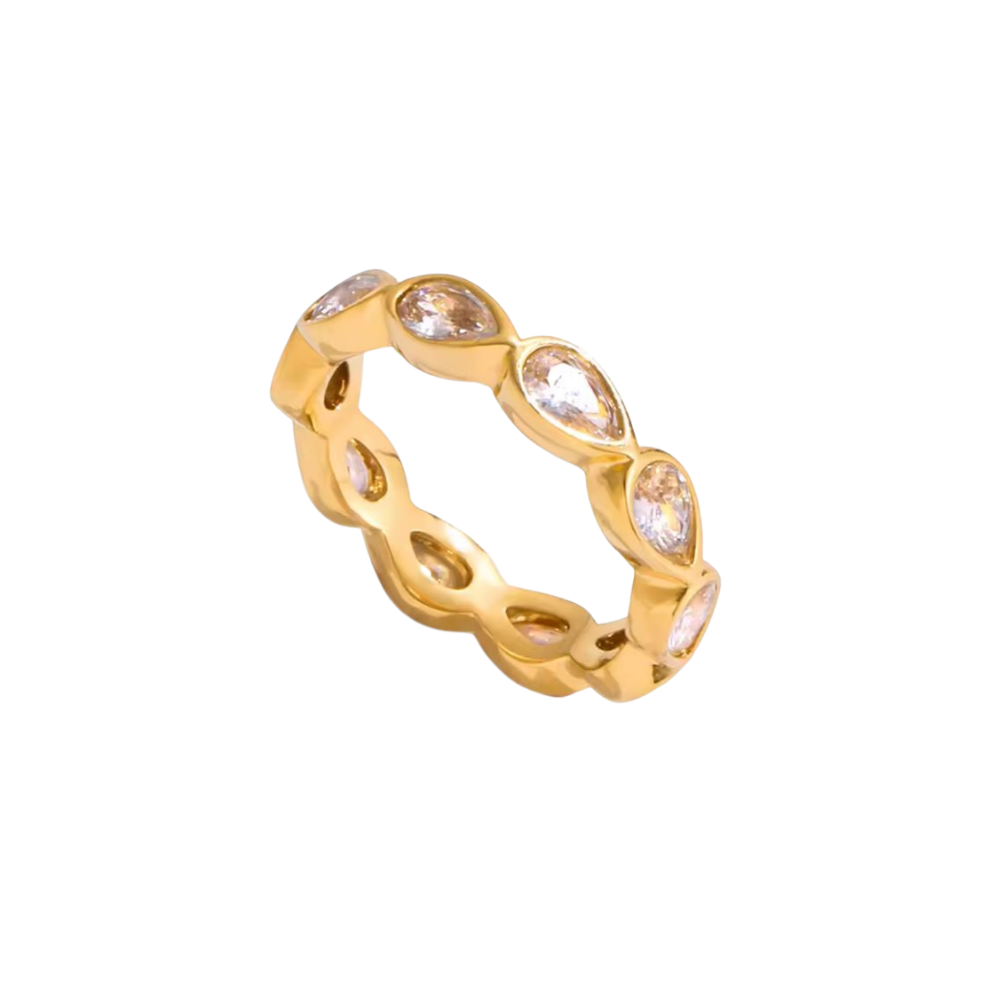 Gold ring with embedded stones on a white background