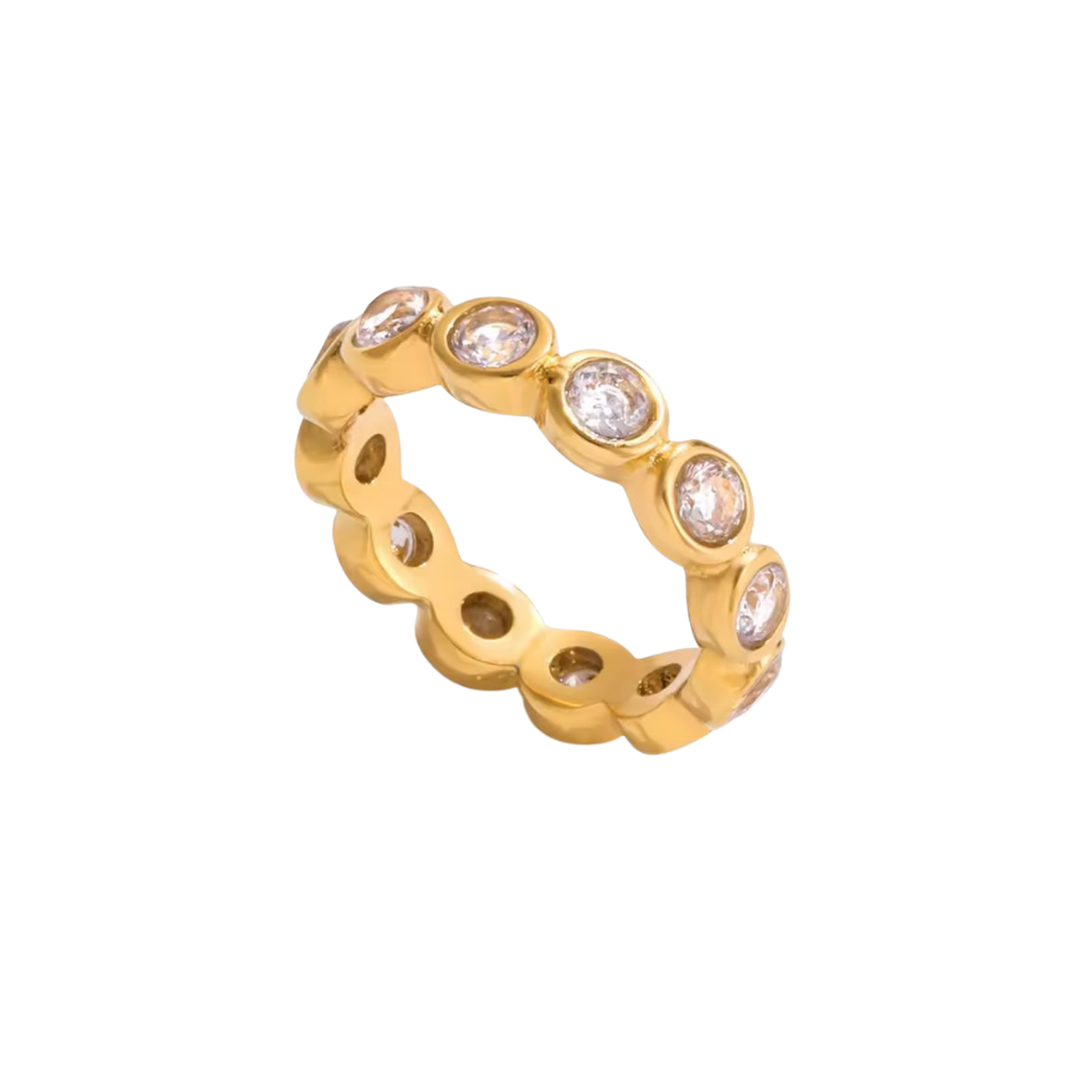 Gold ring with embedded diamonds on a white background