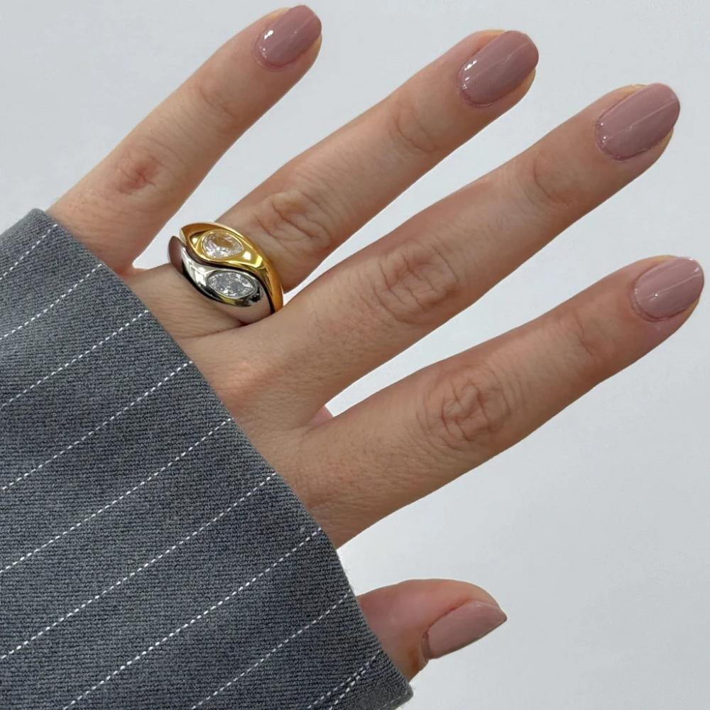 Hand Wearing a Chunky Water Drop Ring (Gold / Silver)
