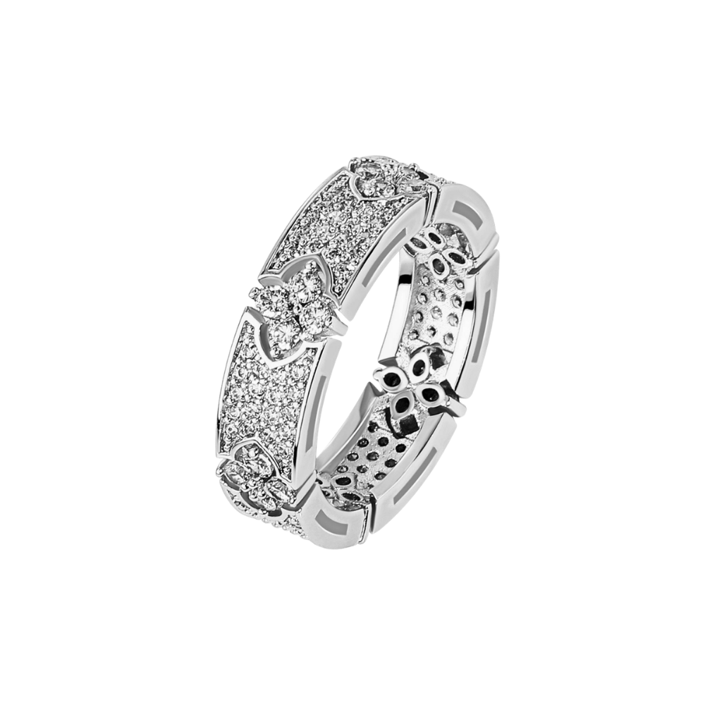 Silver ring with floral designs and small diamonds on a white background