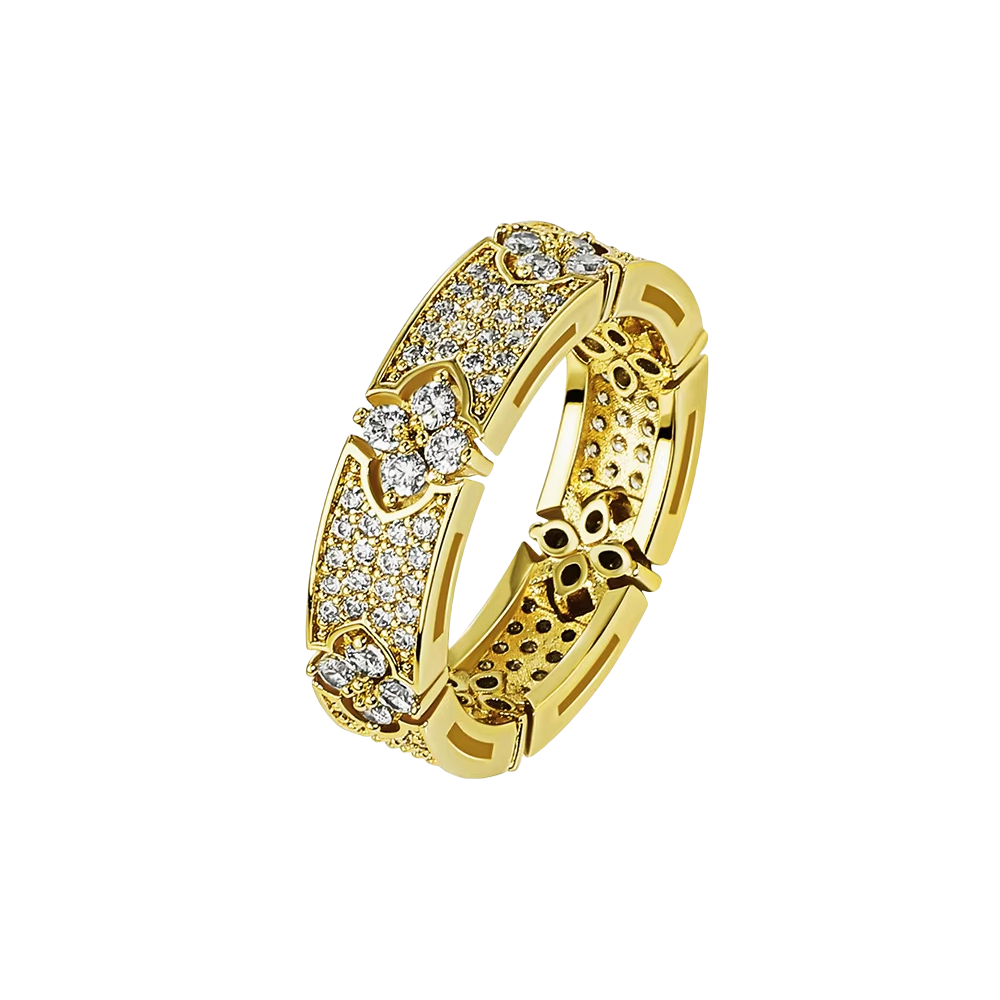 Gold ring with diamond accents on a white background