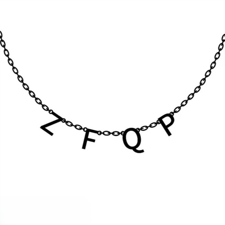 Necklace with black letter pendants on a white background