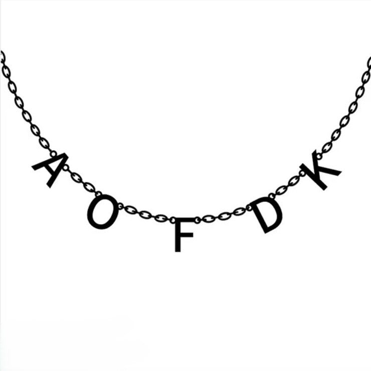 Necklace with black lettered pendants on a white background