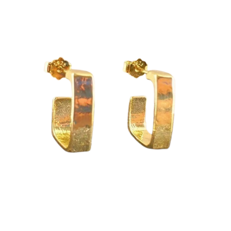 Gold hoop earrings on a white background