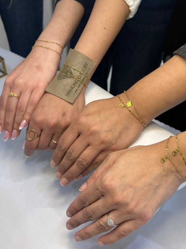 Hands showing after getting permanent jerwellery from Diamond Galore Bolton