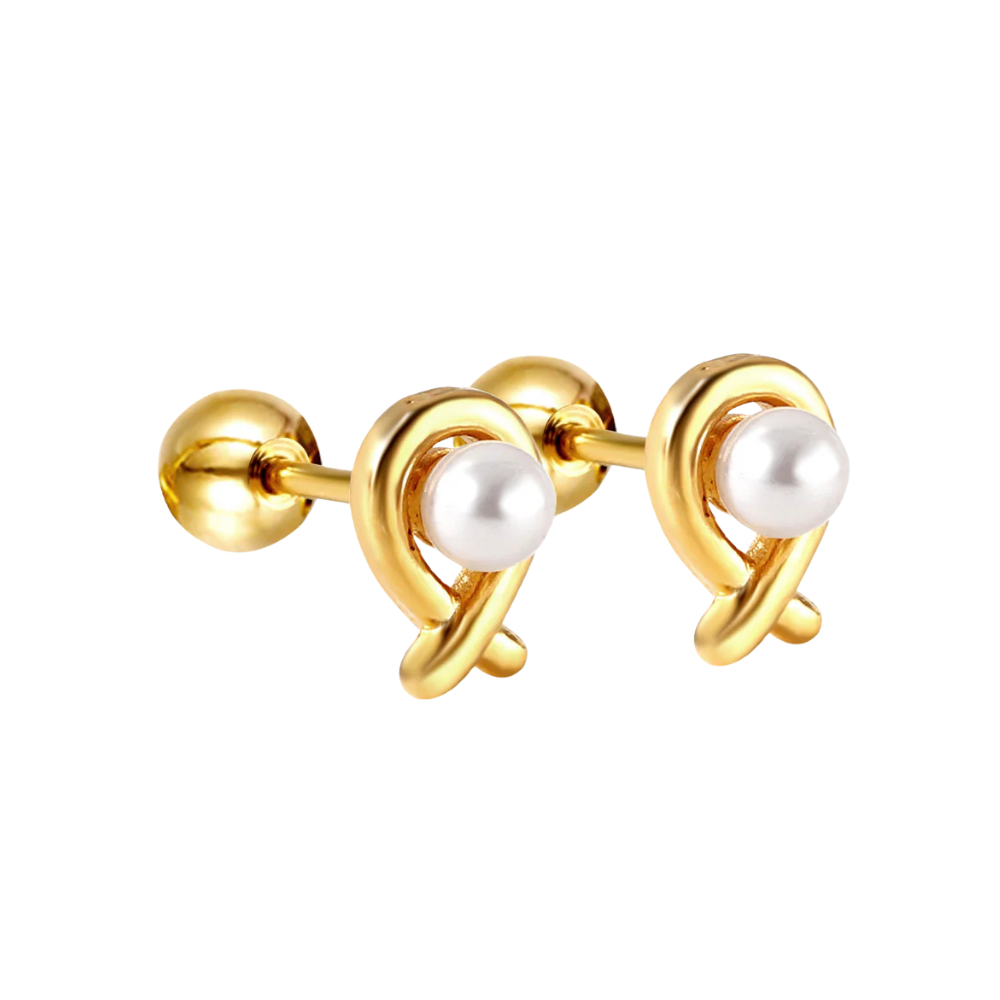 Gold earring with pearl on a white background