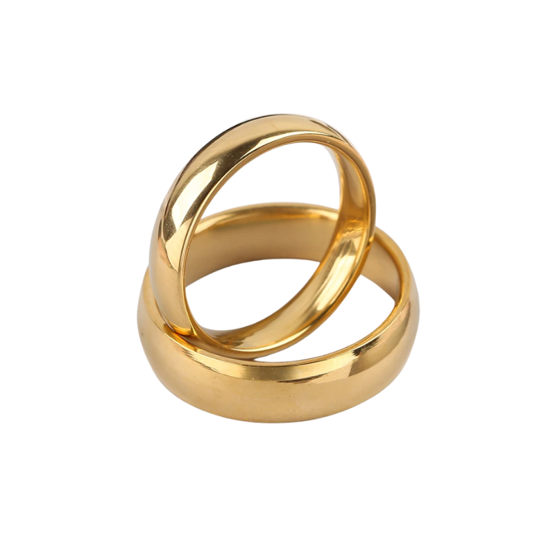 Gold ring with a modern design on a white background