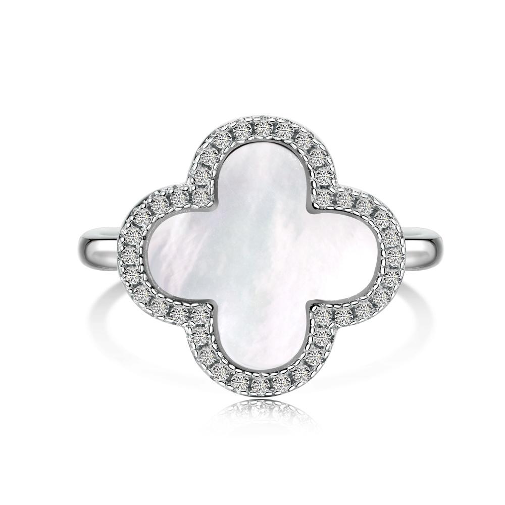 A clover-shaped ring with white shell accent, in 925 sterling silver with a rhodium plating, displayed against a white background.